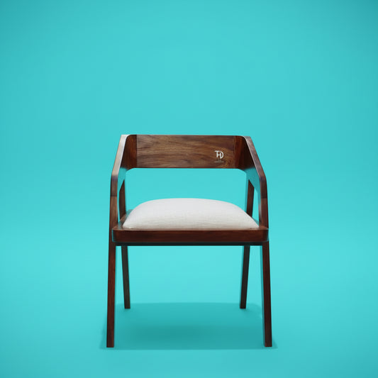 A brown Loria chair with an upholstered seat, made from solid Sheesham wood.