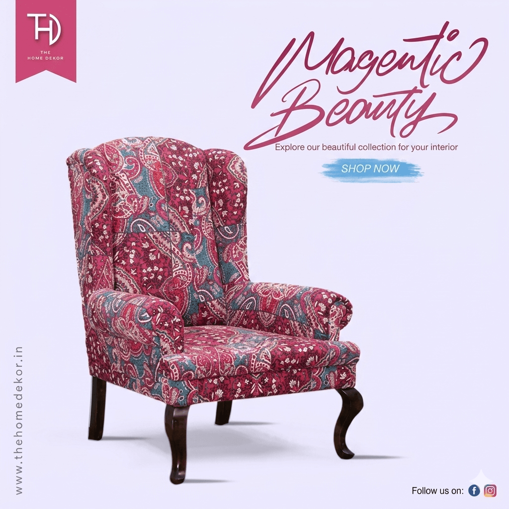 A luxurious Maharaja Wing Chair with a red pejali fabric and intricate katha work on it.