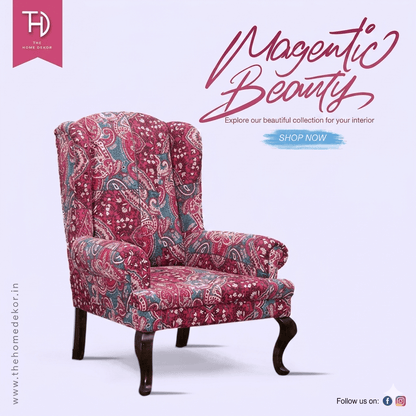 A luxurious Maharaja Wing Chair with a red pejali fabric and intricate katha work on it.