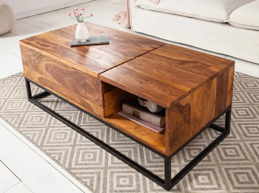 Wooden coffee table with black metal legs in a living room setting