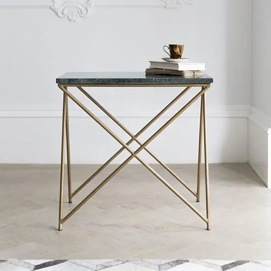 A rectangular green marble side table with a gold coated metal frame. 