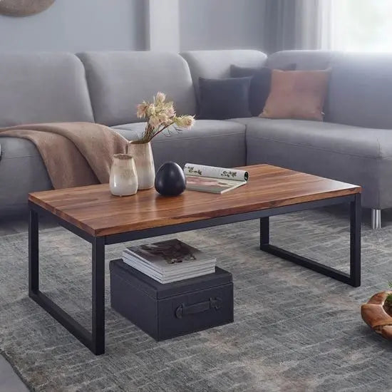 A modern design rectangular Marshal coffee table made in Solid sheesham wood and metal frame.  