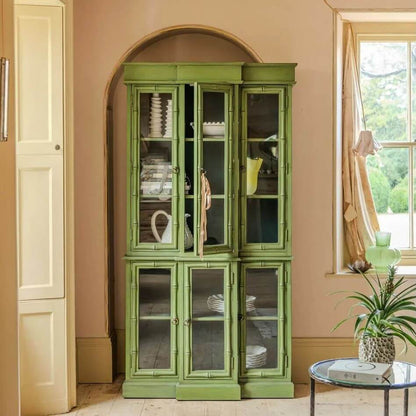 Green glass-fronted cabinet made in solid mango wood. 