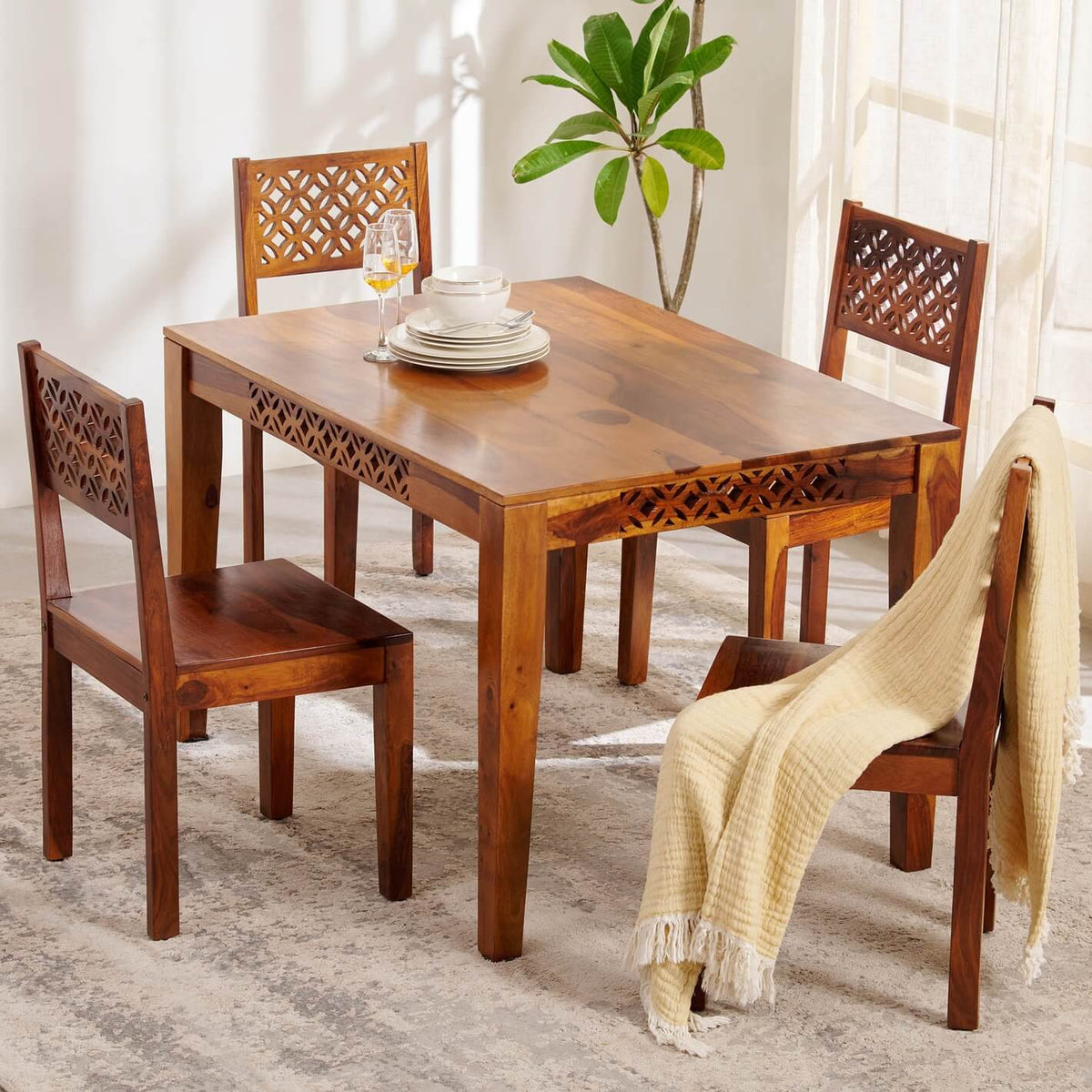 A rectangular shape Solid sheesham wood mercury dining table. 