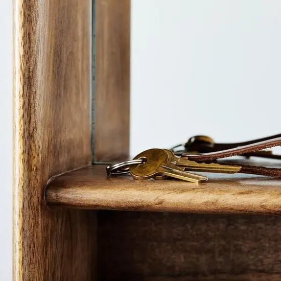 Mirror frame with shelve