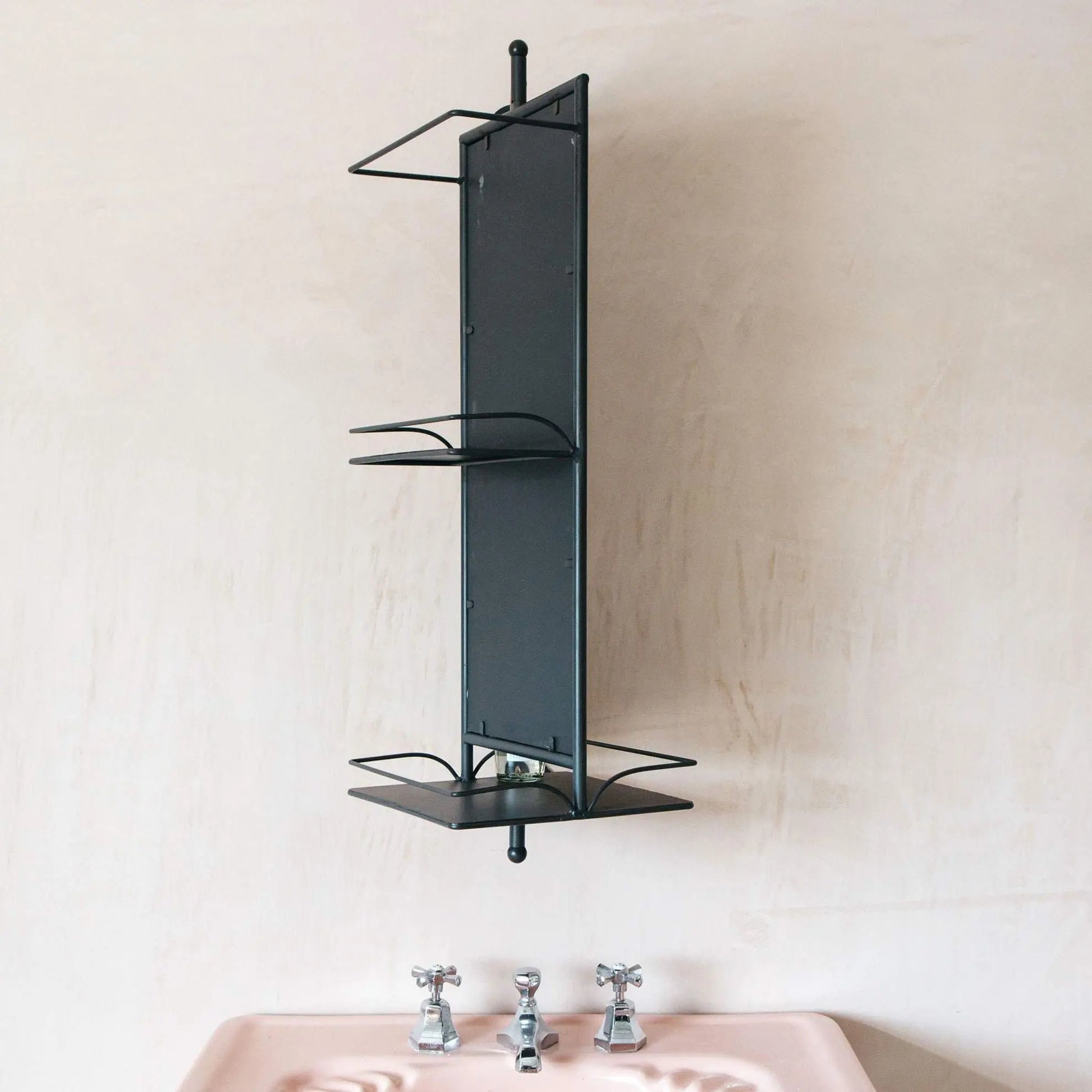 Black wall-mounted shelf Nyhamn Mirror.