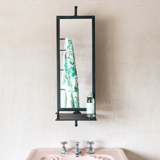 Wall-mounted mirror with a shelf Nyhamn Mirror. 