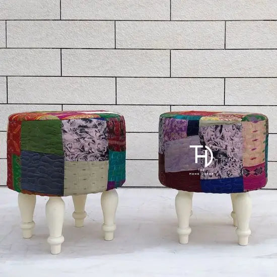 A multicolored silk patchwork pouf.