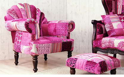 A peacock pink sofa with a vibrant and multicolored fabric, hand-made and manufactured in solid Sheesham wood.