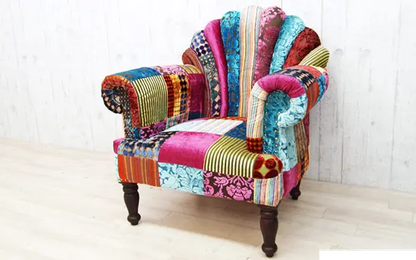 showcasing a variety of fabric patterns and colors. Assorted patchwork sofa.