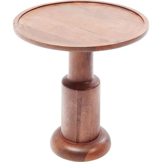 A round, natural wood colored side table made of mango wood with a turned leg design.