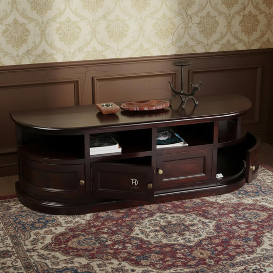 A brown, half-round shaped TV cabinet with four doors and a shelf. made of wood, with metal handles.