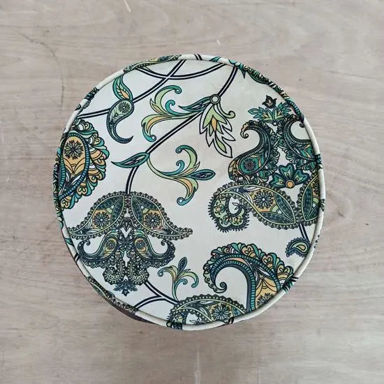 side carving rajsee footstool peach made in solid sheesham wood with flower printed green velvet fabric. 