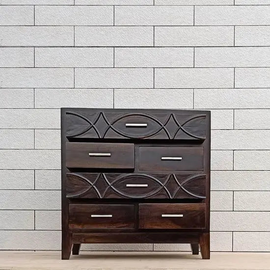 Six drawer chest made in Sheesham Wood with fish design in big drawer panel. 