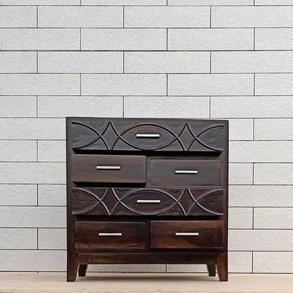 Six drawer chest made in Sheesham Wood with fish design in big drawer panel. 