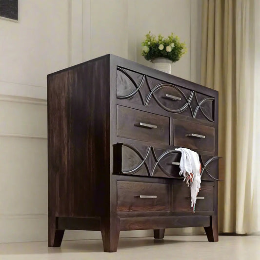 Six drawer chest made in Solid Sheesham Wood with fish design in big drawer panel. 