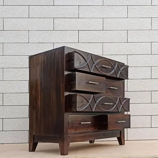 Six drawer chest made in Solid Wood with fish design in big drawer panel. 