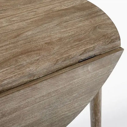 Round Extendable Dining Table Made of mango wood.