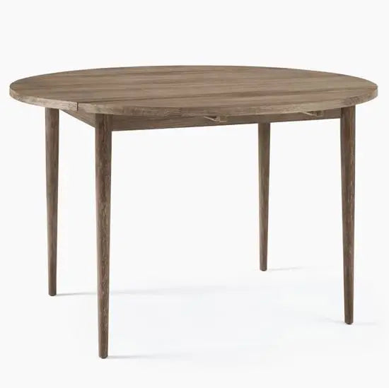 Solid Mango Wood Round dining table with sleek legs.
