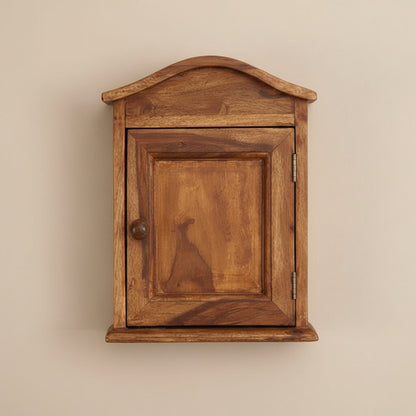 Solid Wood One Door Round key holder in Natural Finish. 