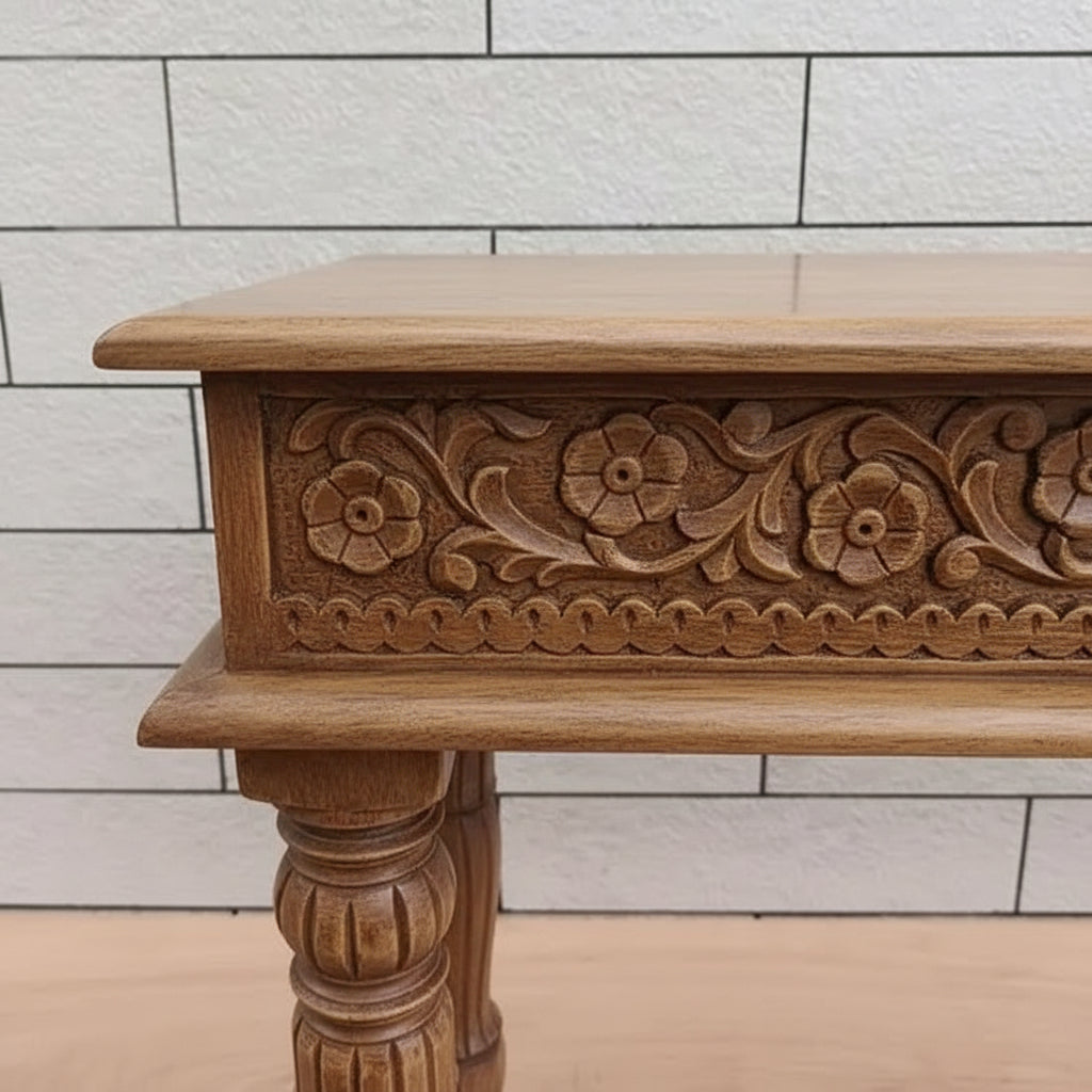 Side and legs carving console table made in mango wood in natural finish. 