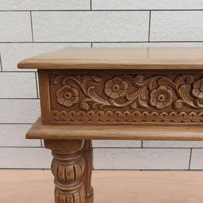Side and legs carving console table made in mango wood in natural finish. 