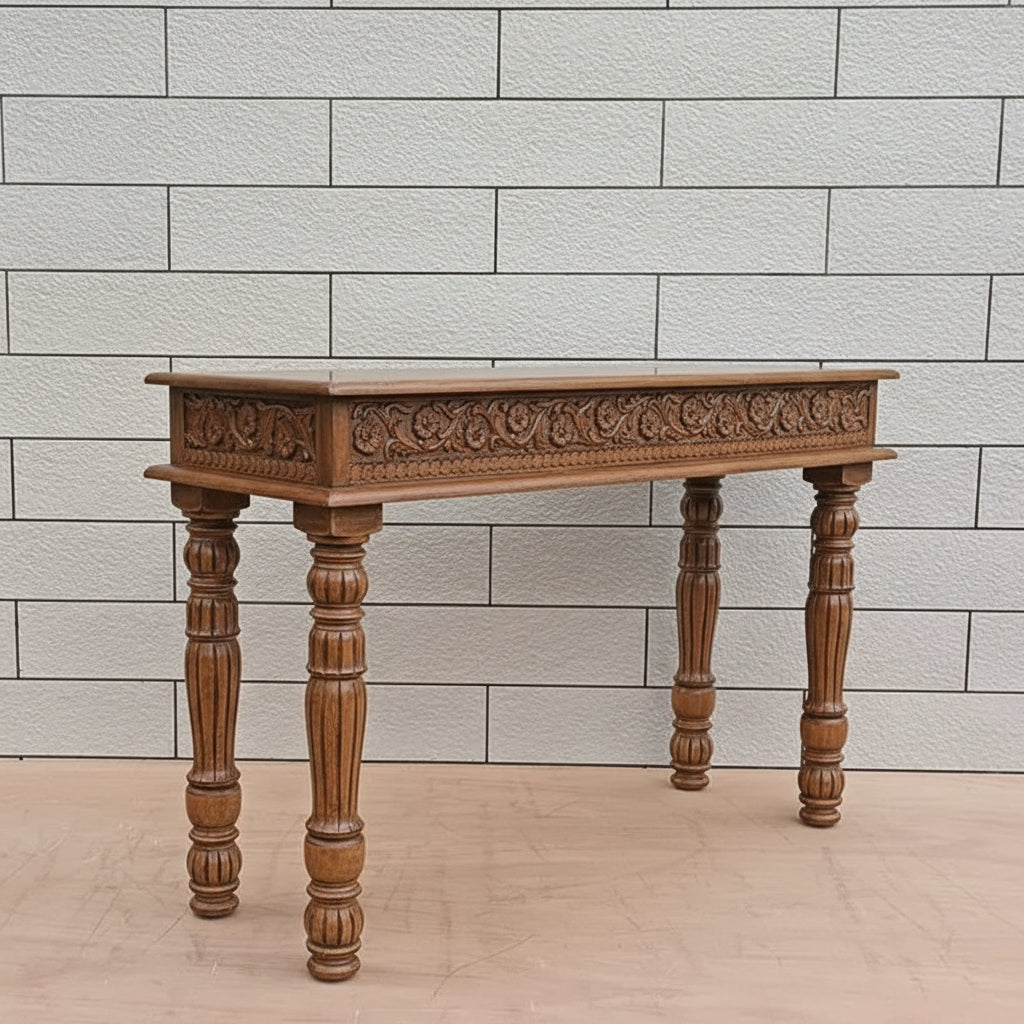 Side and legs carving console table made in solid mango wood in natural finish. 