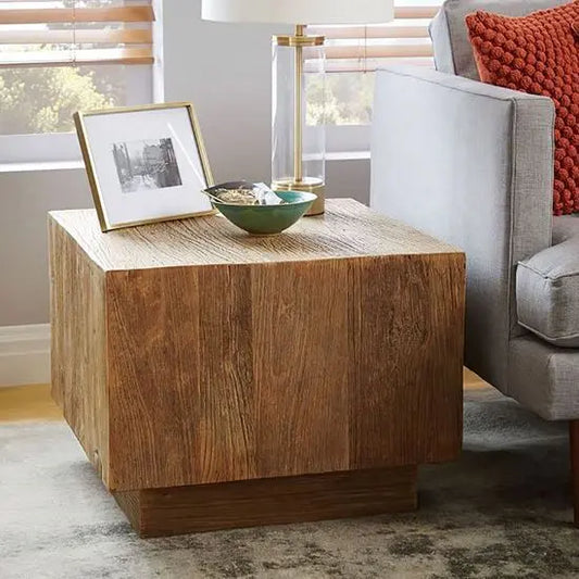 A square-shaped Squiral Samavika coffee table made of mango wood.