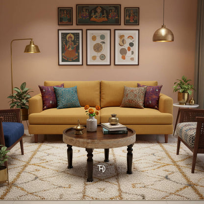 Round Mango wood trendy ringbud coffee table with intricate carvings and curved legs. 