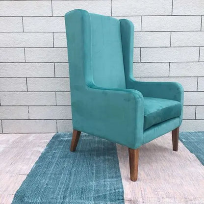 Sheesham Wood Modern design wing chair in natural finish with green velvet fabric. 
