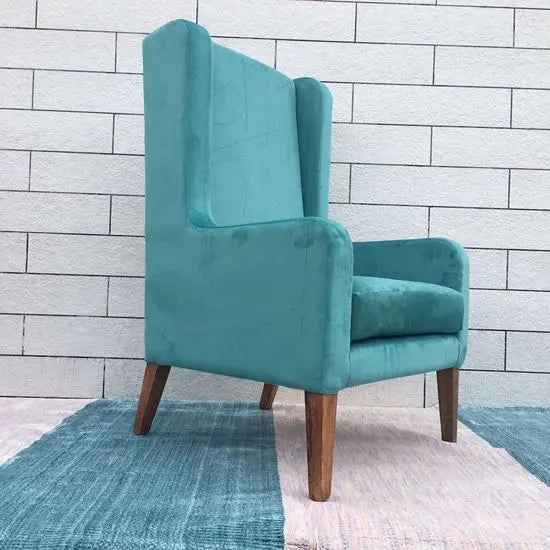 Solid Sheesham Wood Modern design wing chair in natural finish with green velvet fabric. 