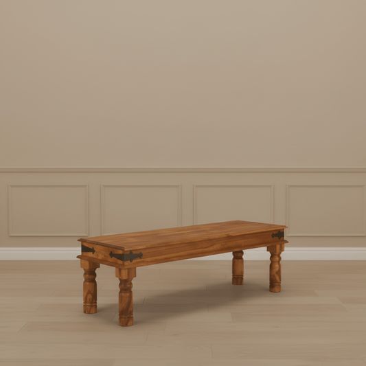 A vintage dining bench with a small rectangular tabletop and carved wooden legs. Three seater dining bench.
