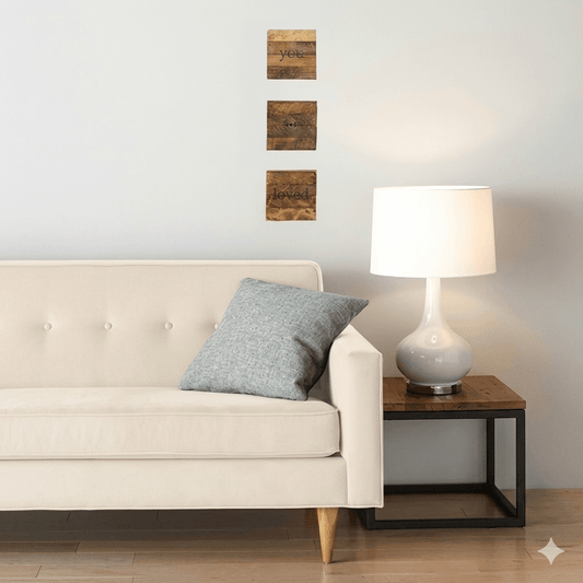 A set of three wooden decorative wall arts.