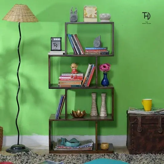 Four Tier Zig Zag Bookcase Pt Made in Solid Sheesham Wood. This Bookcase Looks So Classy. This Bookcase used in Keeps Books and Other Decorative Items. 