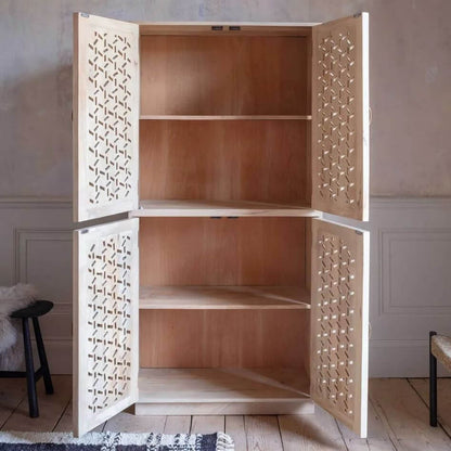 A tall wooden storage cabinet with four doors, shown open to reveal four interior shelves. The outer doors have decorative geometric cutout patterns, and the cabinet interior is made of warm natural wood.