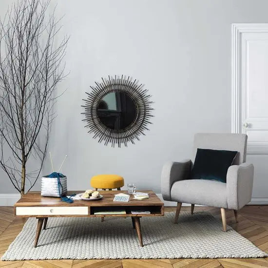 A stylish Zhila coffee table made of Sheesham wood and MDF with two drawers and two open shelves. 